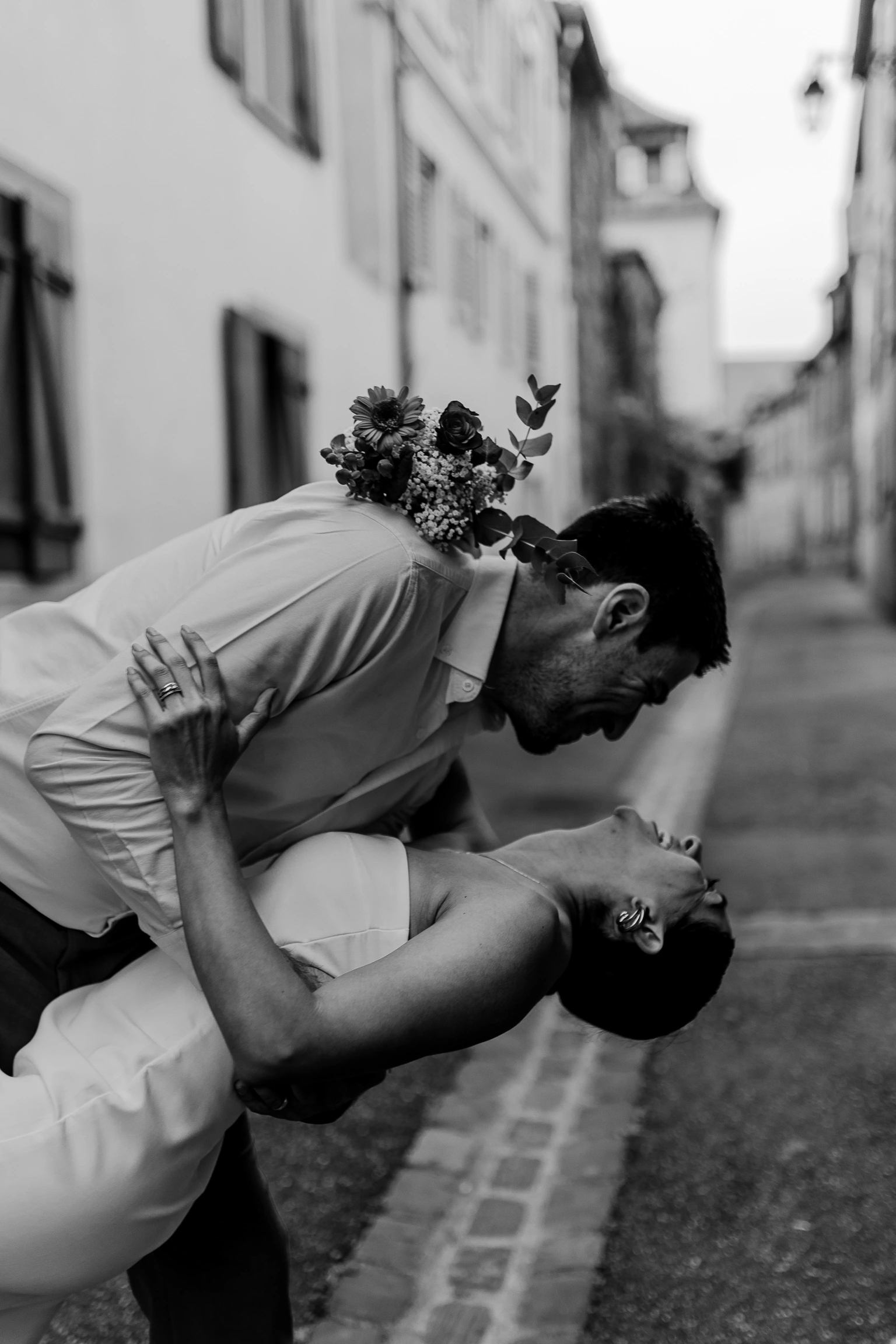 Black-and-white main shot — dip kiss