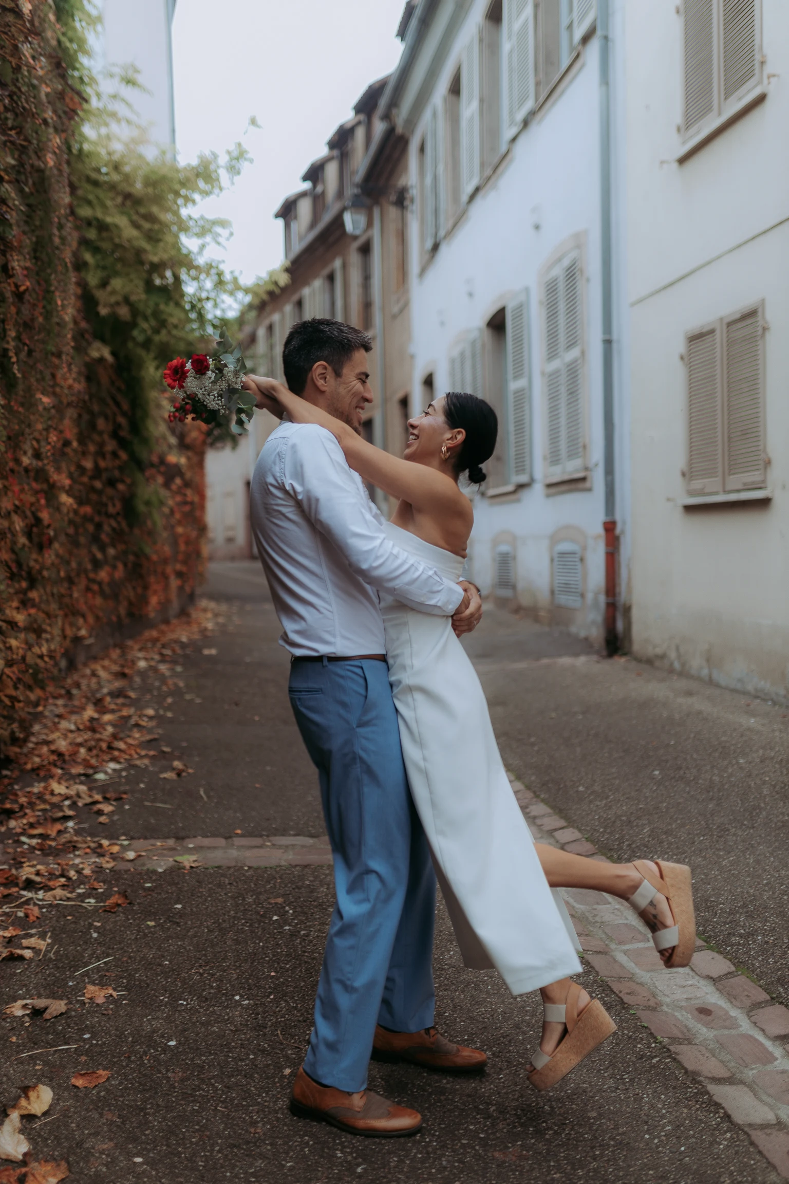Couple embracing in a side alley