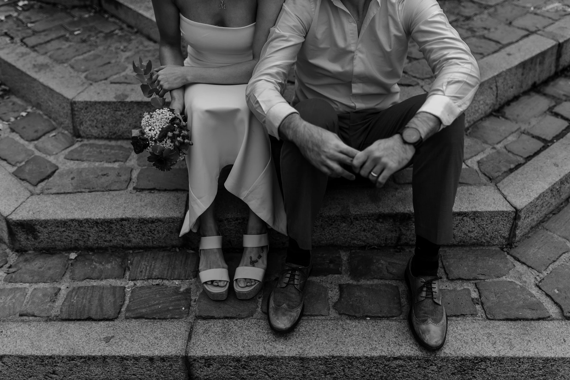 Black-and-white detail — hands