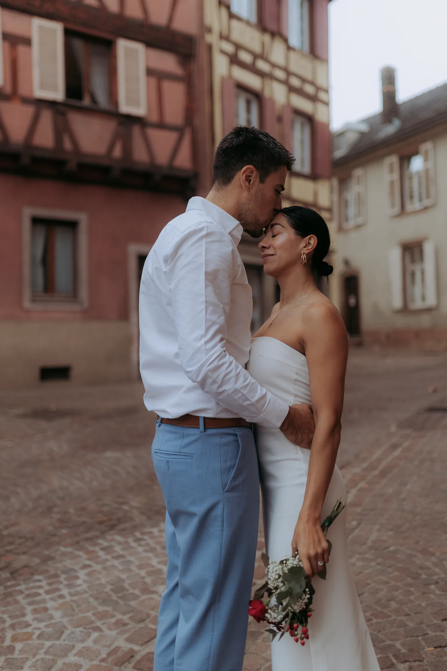 Intimate portrait in a cobblestone alley
