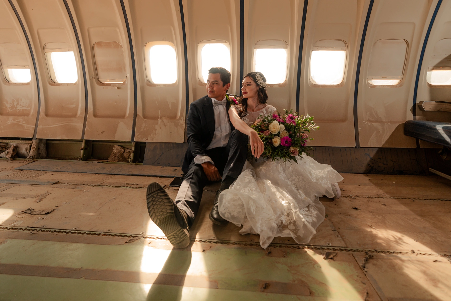Couple in the centre of the fuselage in warm light