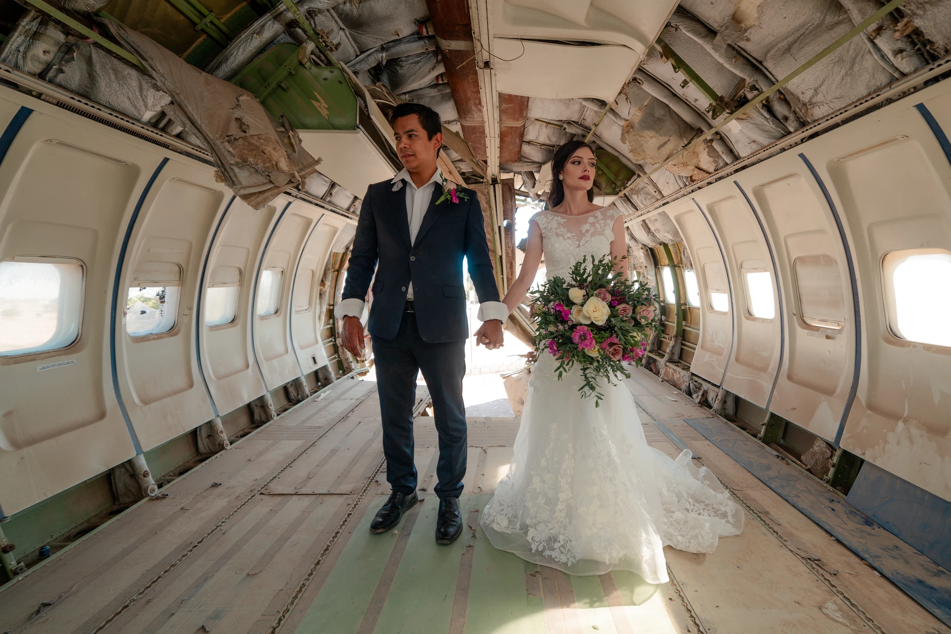 Groom portrait using the aisle's leading lines