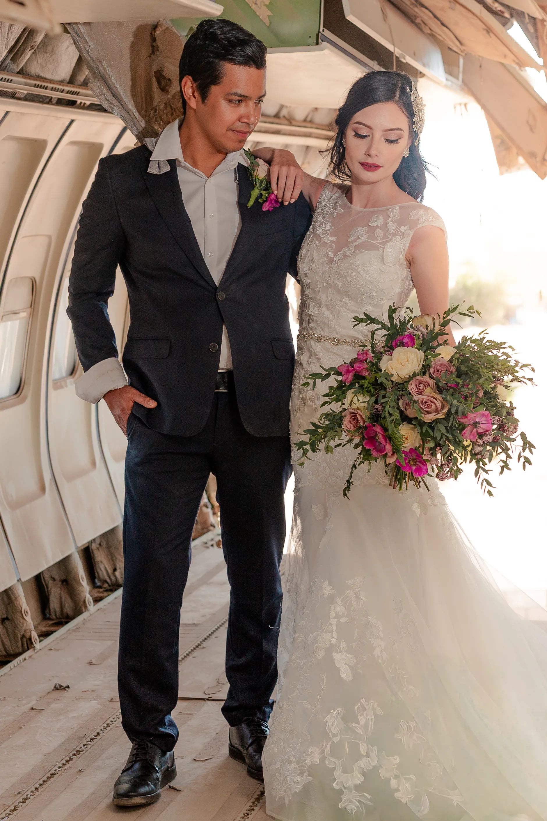 Couple portrait between the oval windows