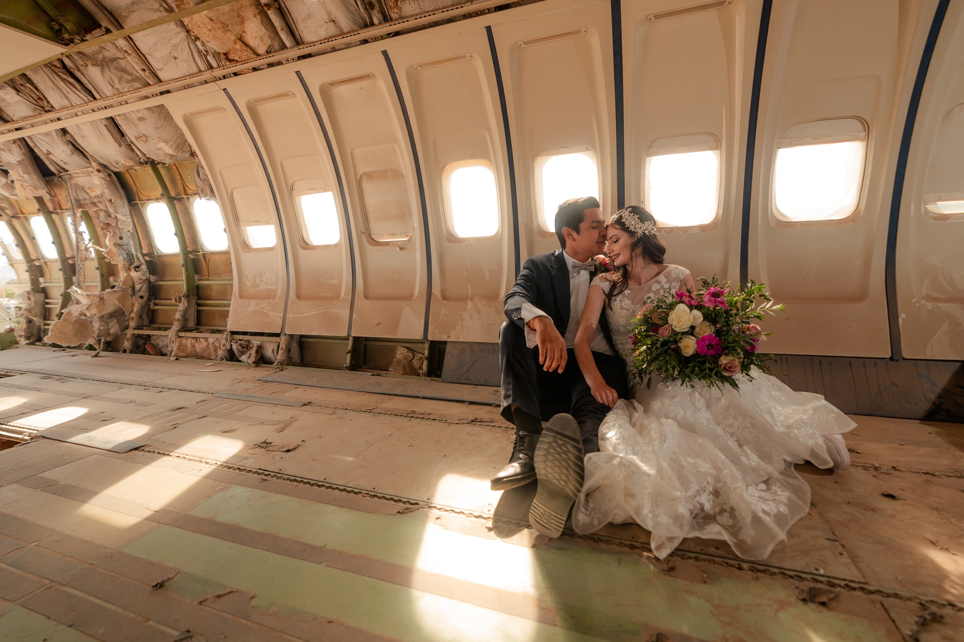 Groom walking alone in the empty centre aisle