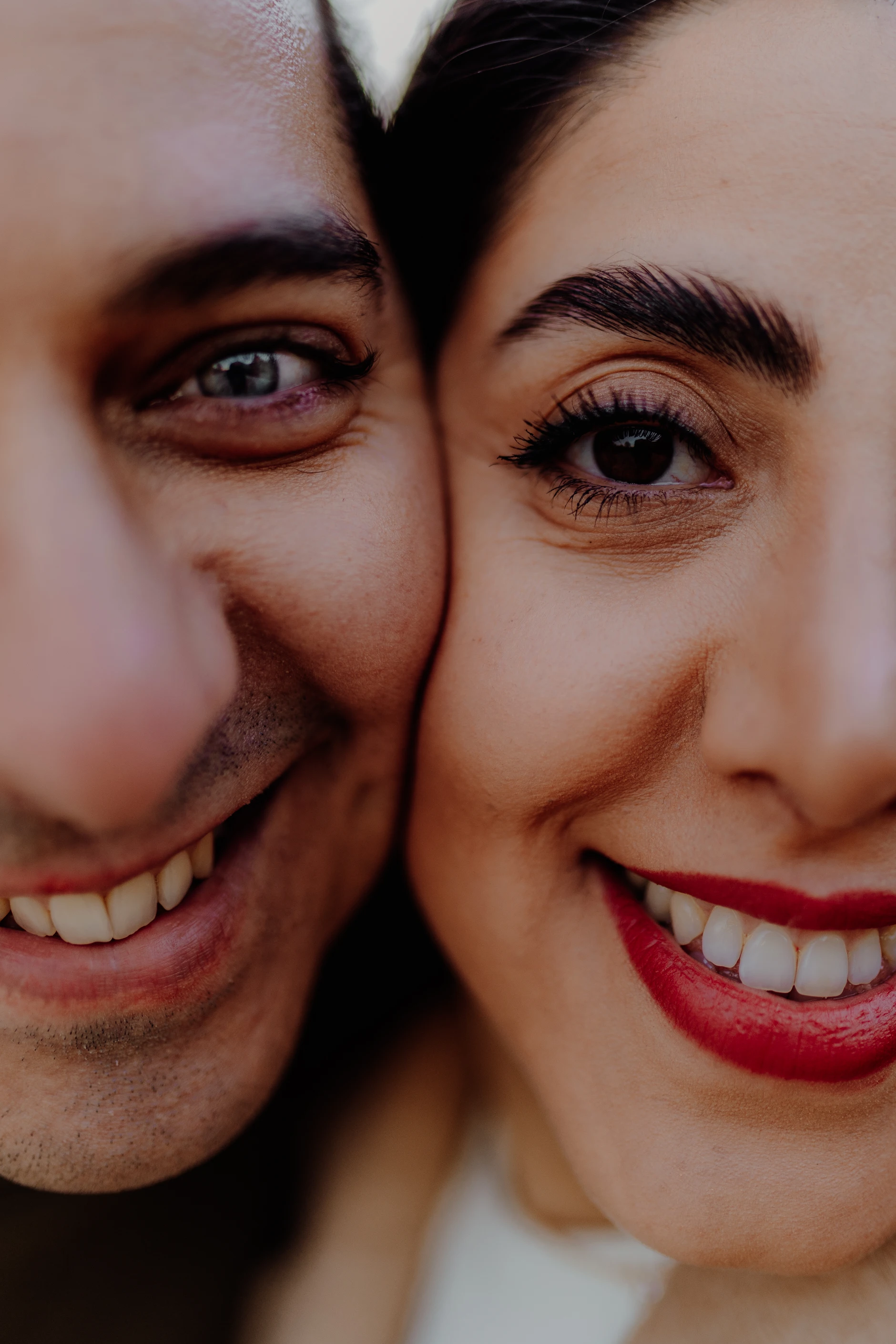 Black-and-white: couple embracing among the riverside willows