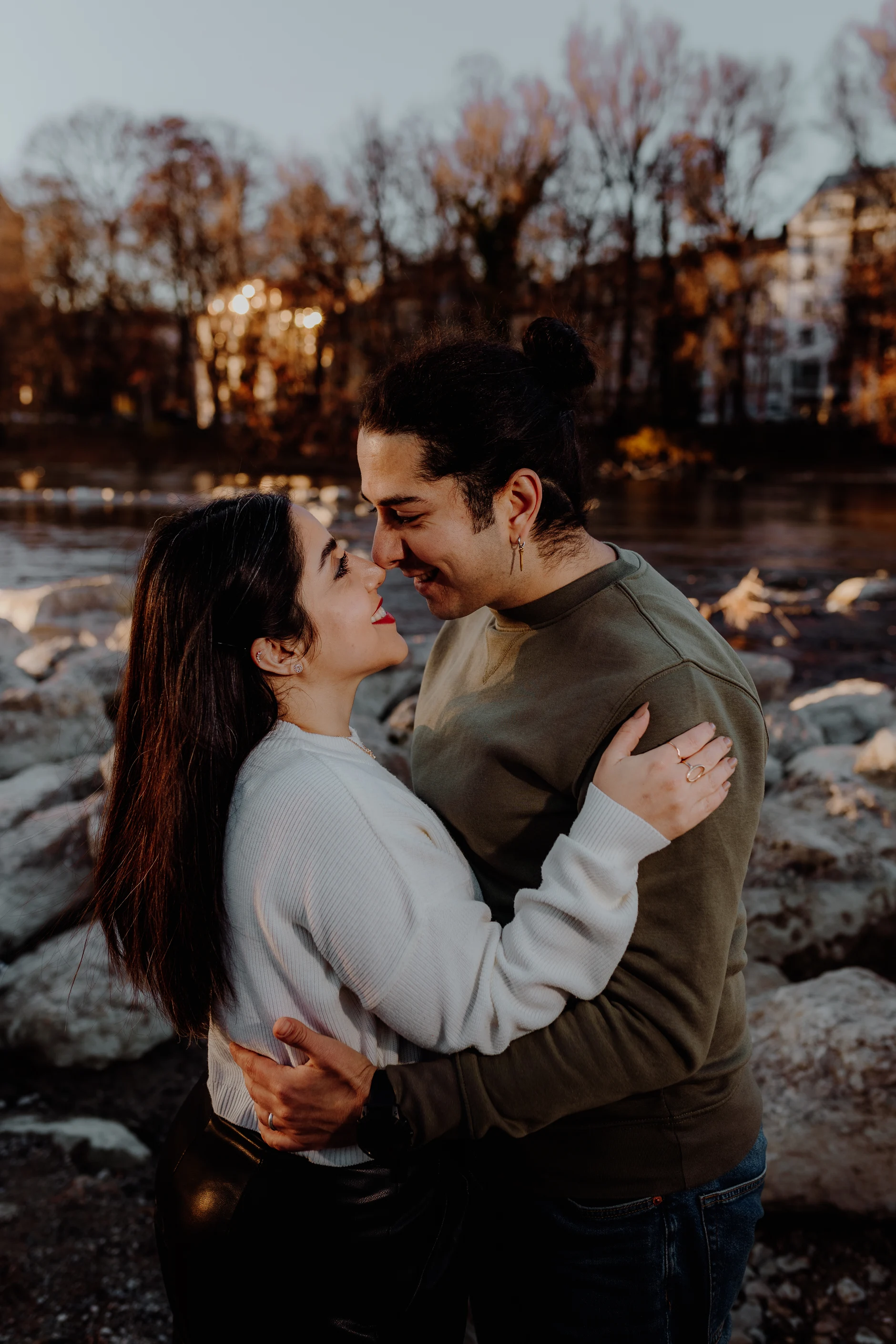 Close portrait of the couple embracing on the boulders