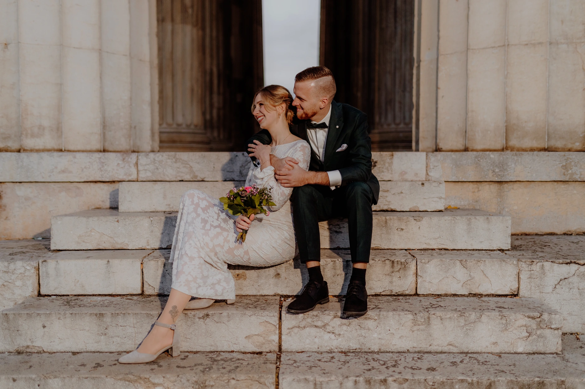 Close-up portrait facing one another in the colonnade