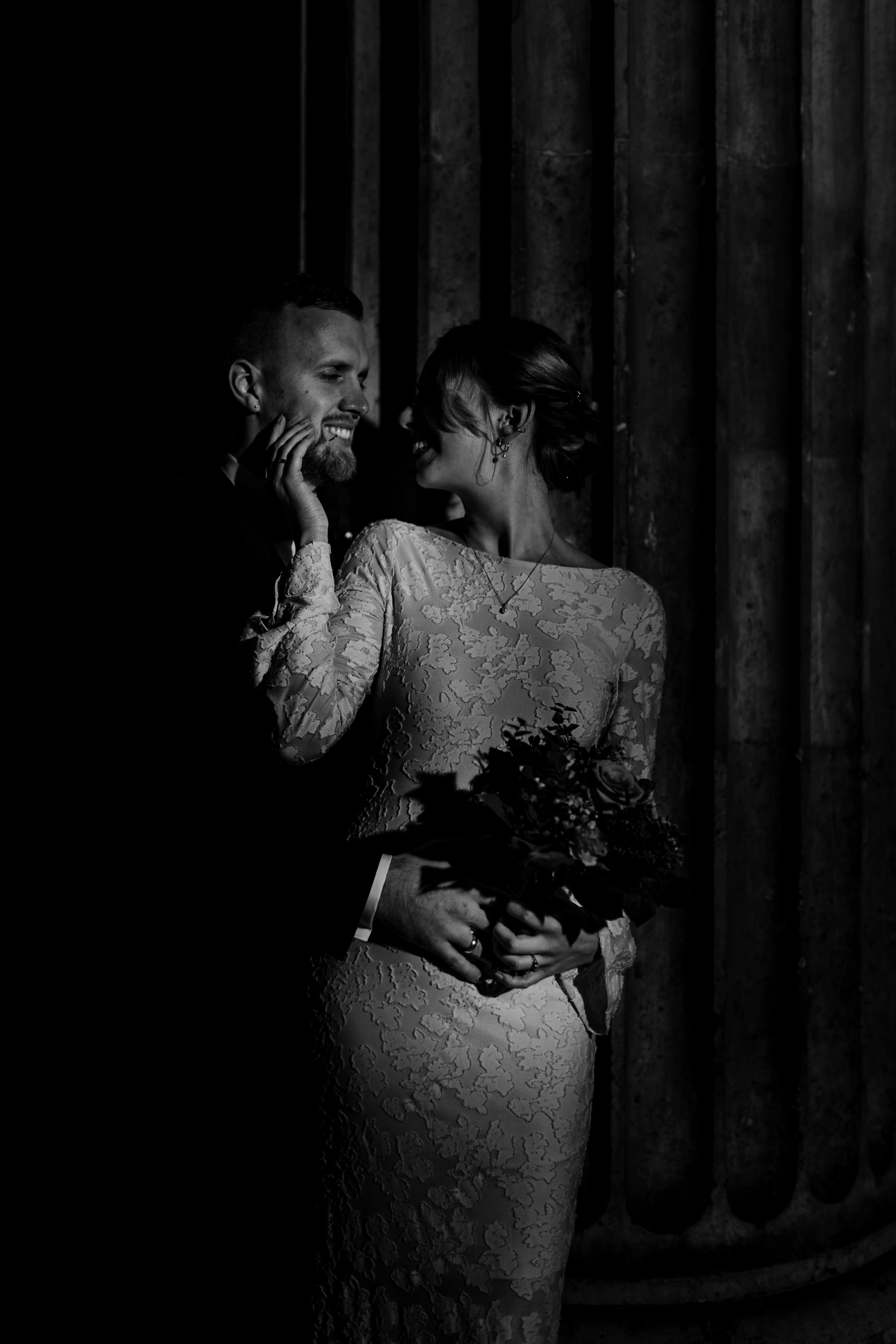 Couple in the dark colonnades at Königsplatz