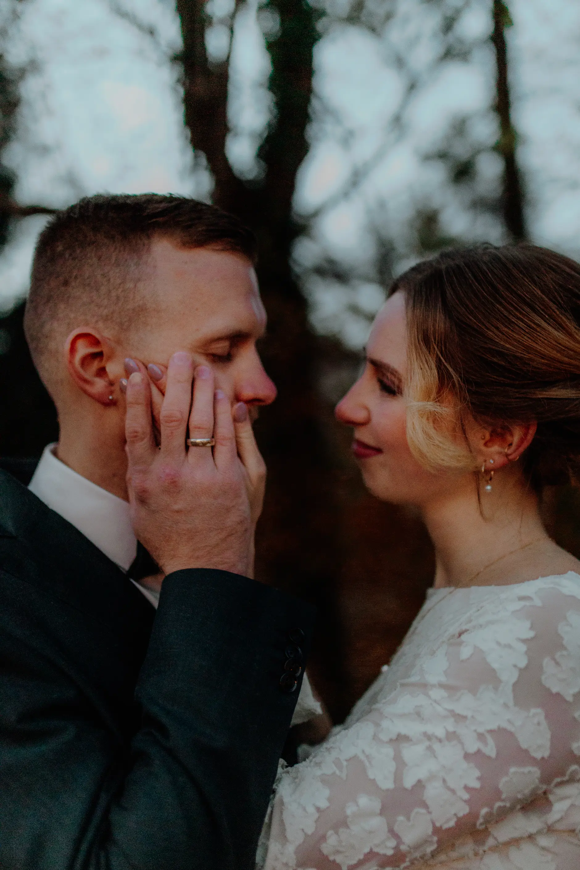 Bride's dress trailing on the stone pavement