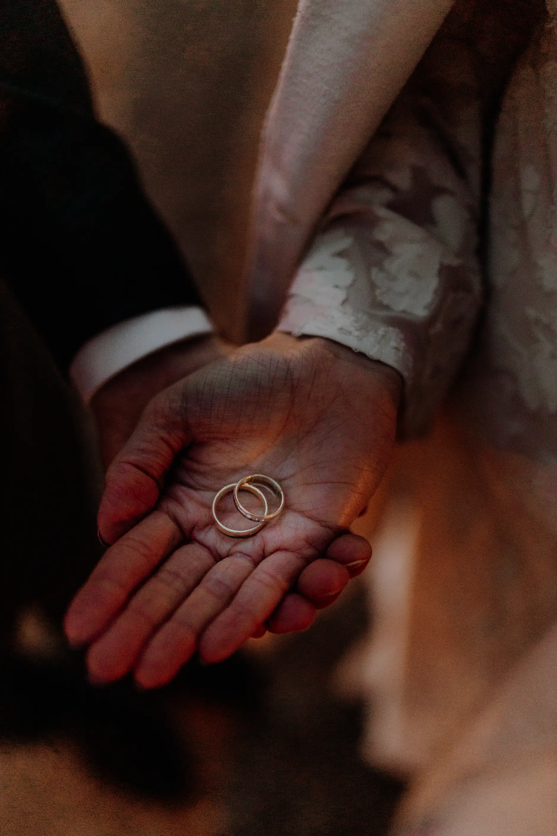 Couple strolling hand in hand through the open square