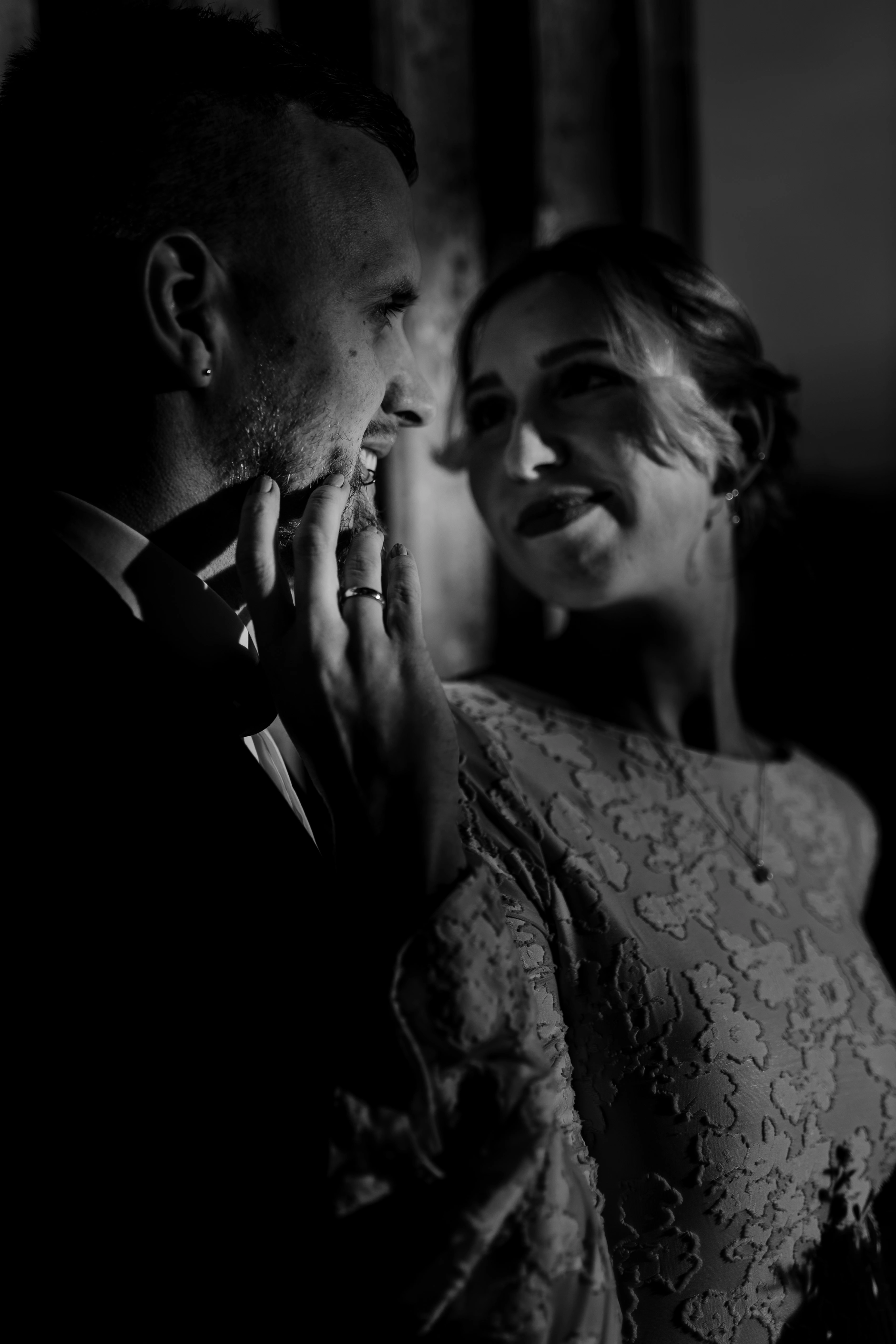 Intimate black-and-white portrait of the couple