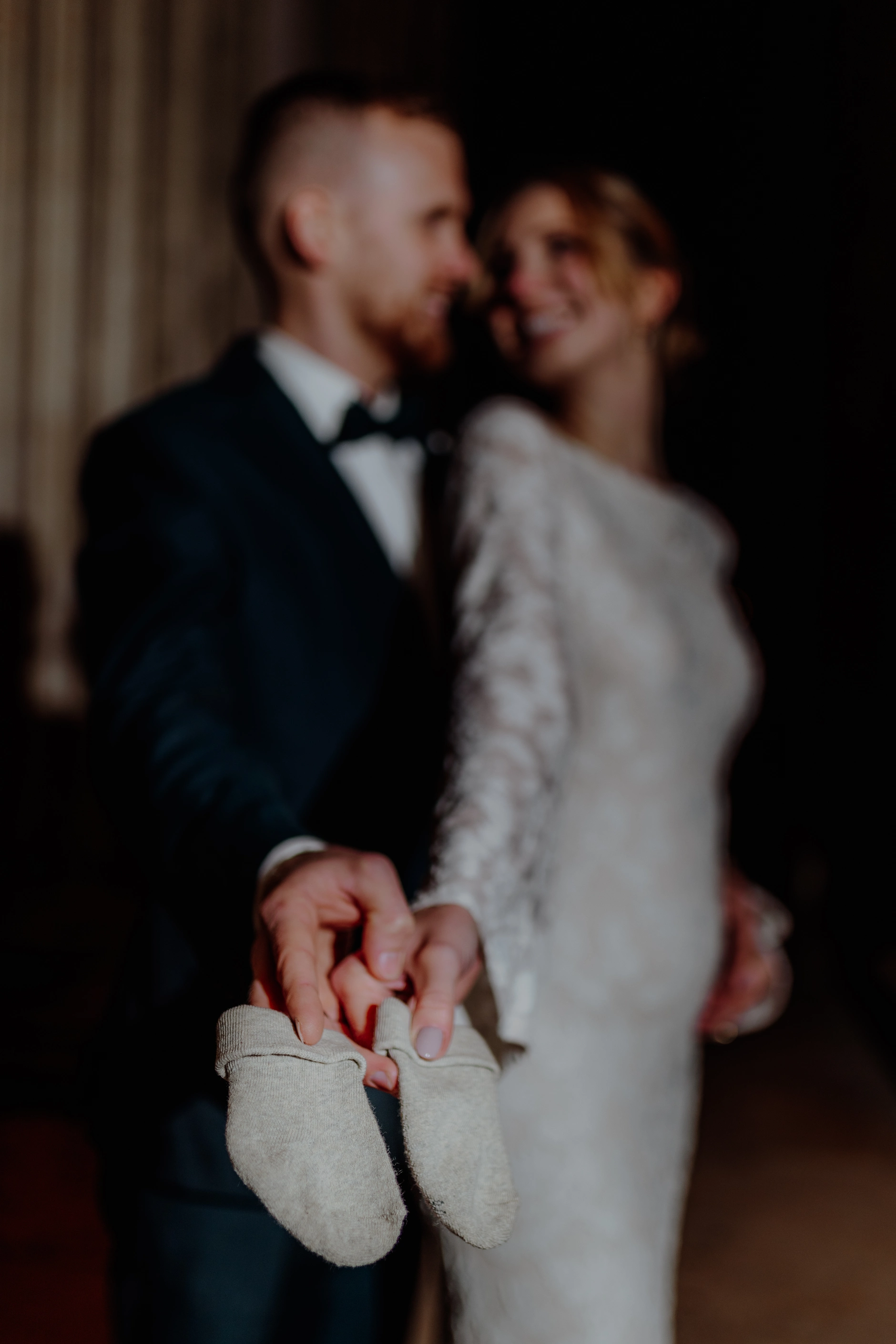 Black-and-white — couple walking into the daylight
