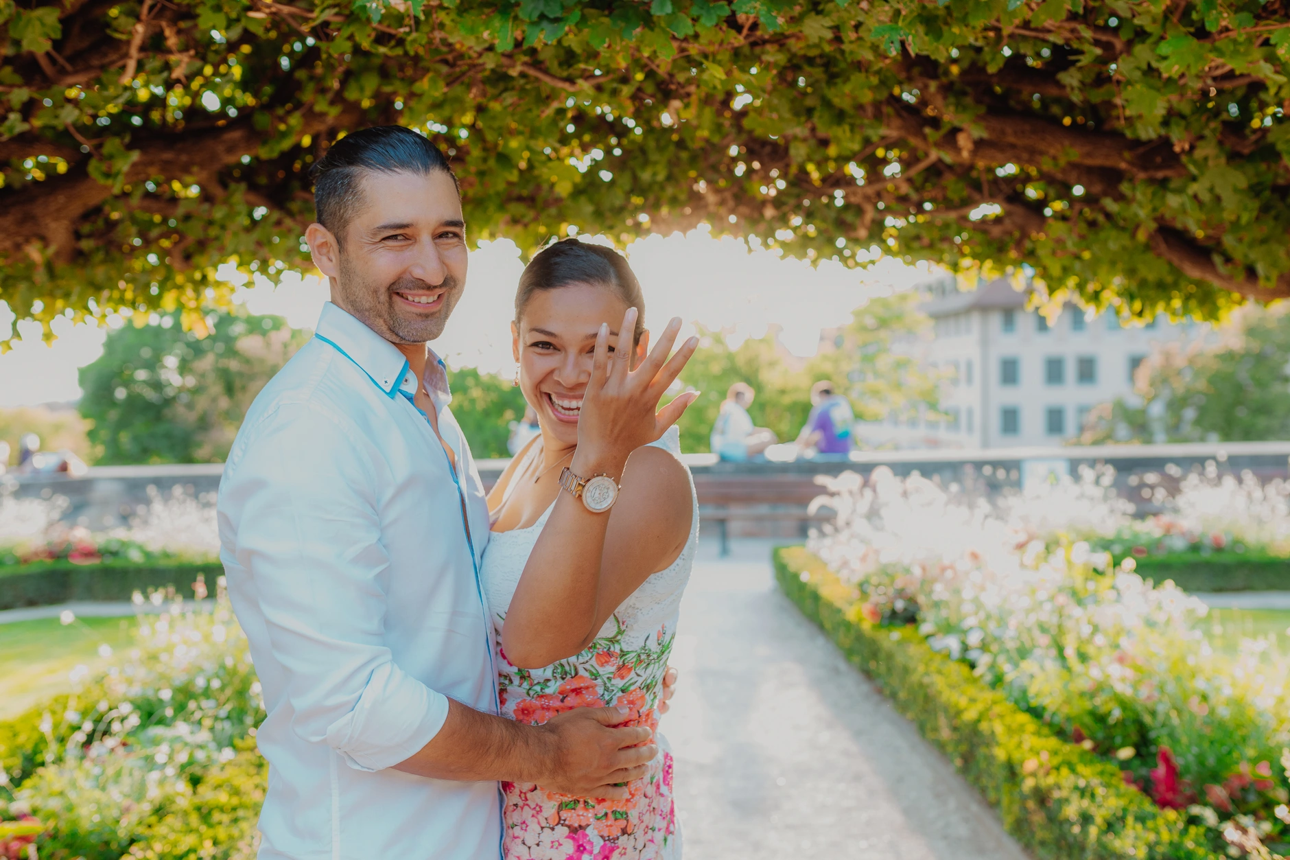 Couple standing in a close embrace in the park