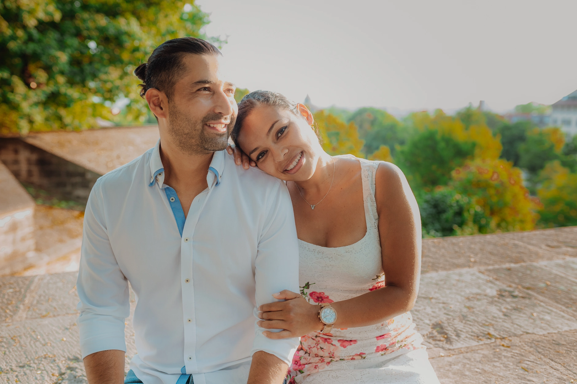 Close couple portrait seated on the Old Town wall