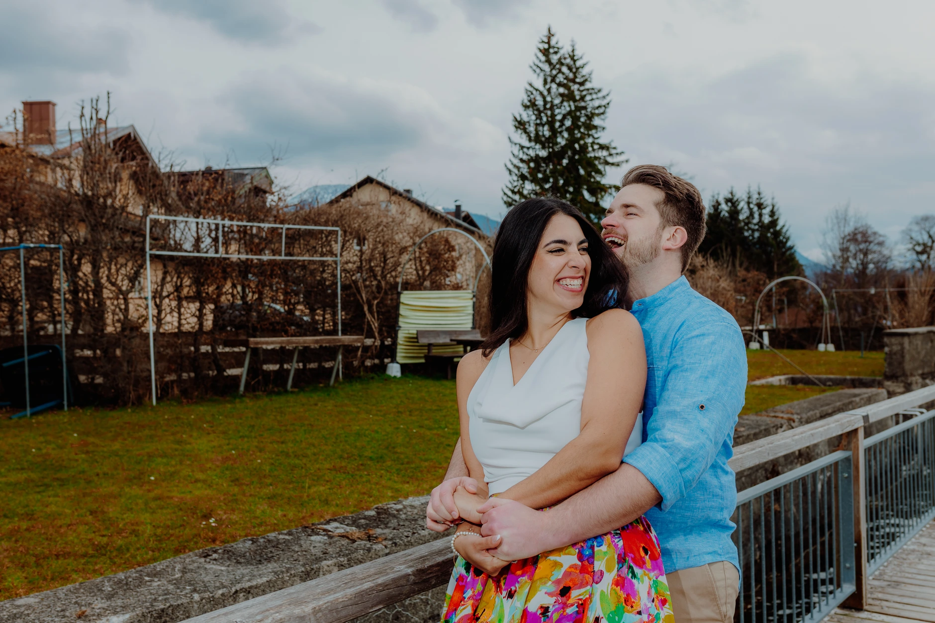 Bride portrait near the lakeside village and church tower