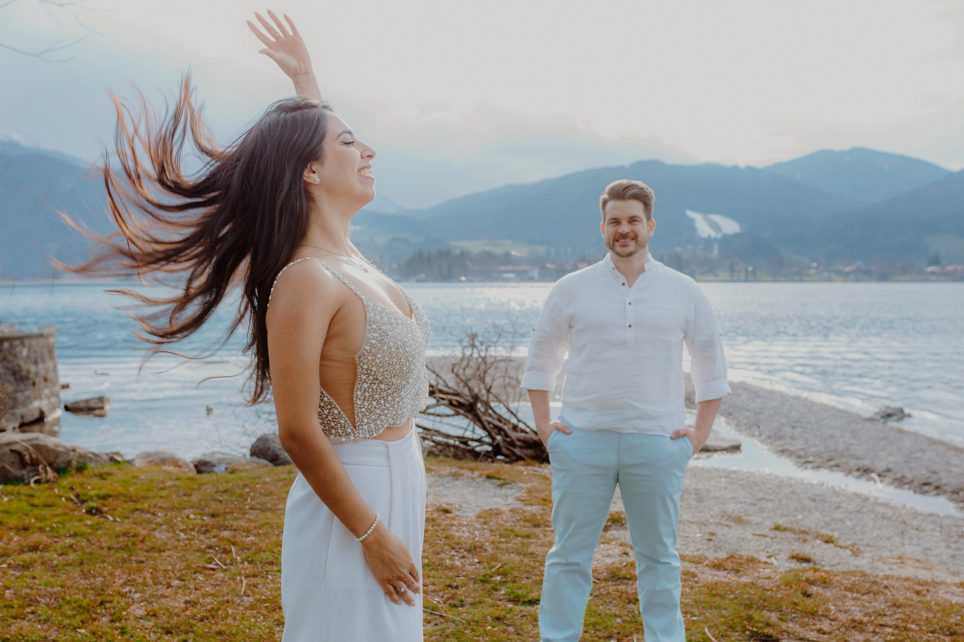 Windblown hair portrait with partner in the background