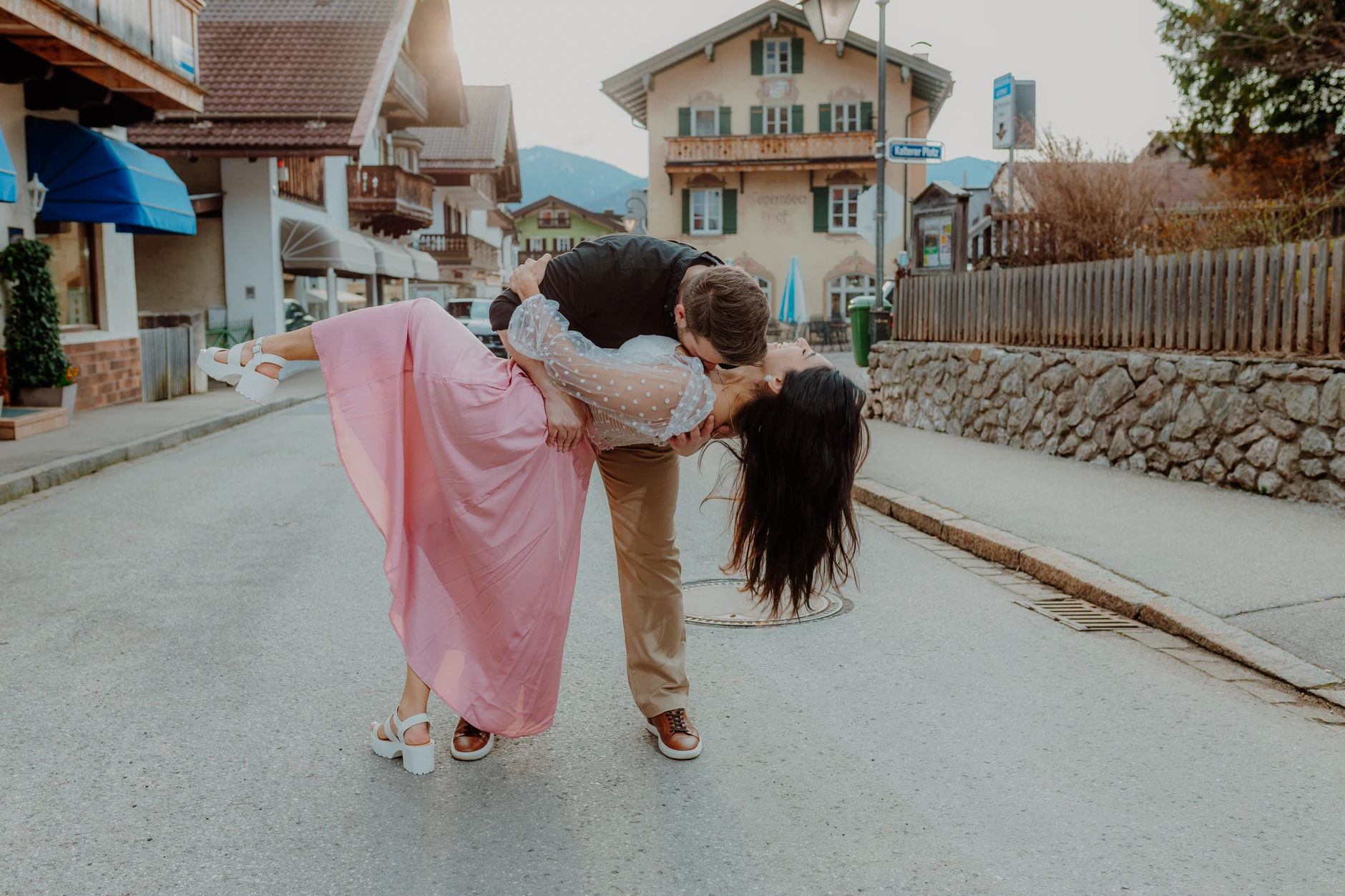 Dramatic dip pose in the village road