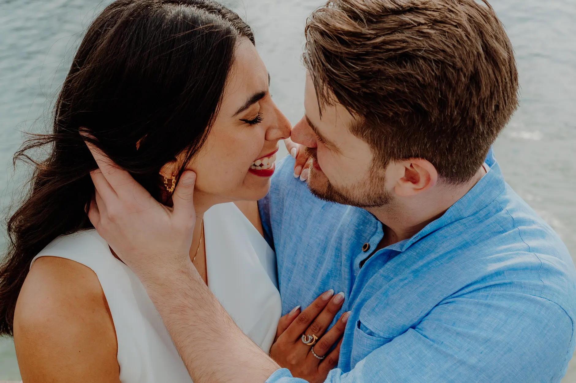Close-up of the couple embracing on the pier