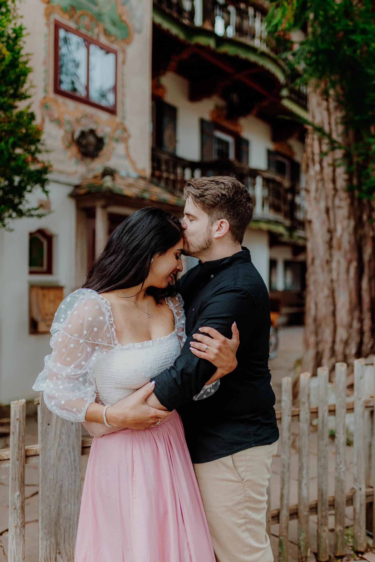 Couple dancing and embracing in the old town street