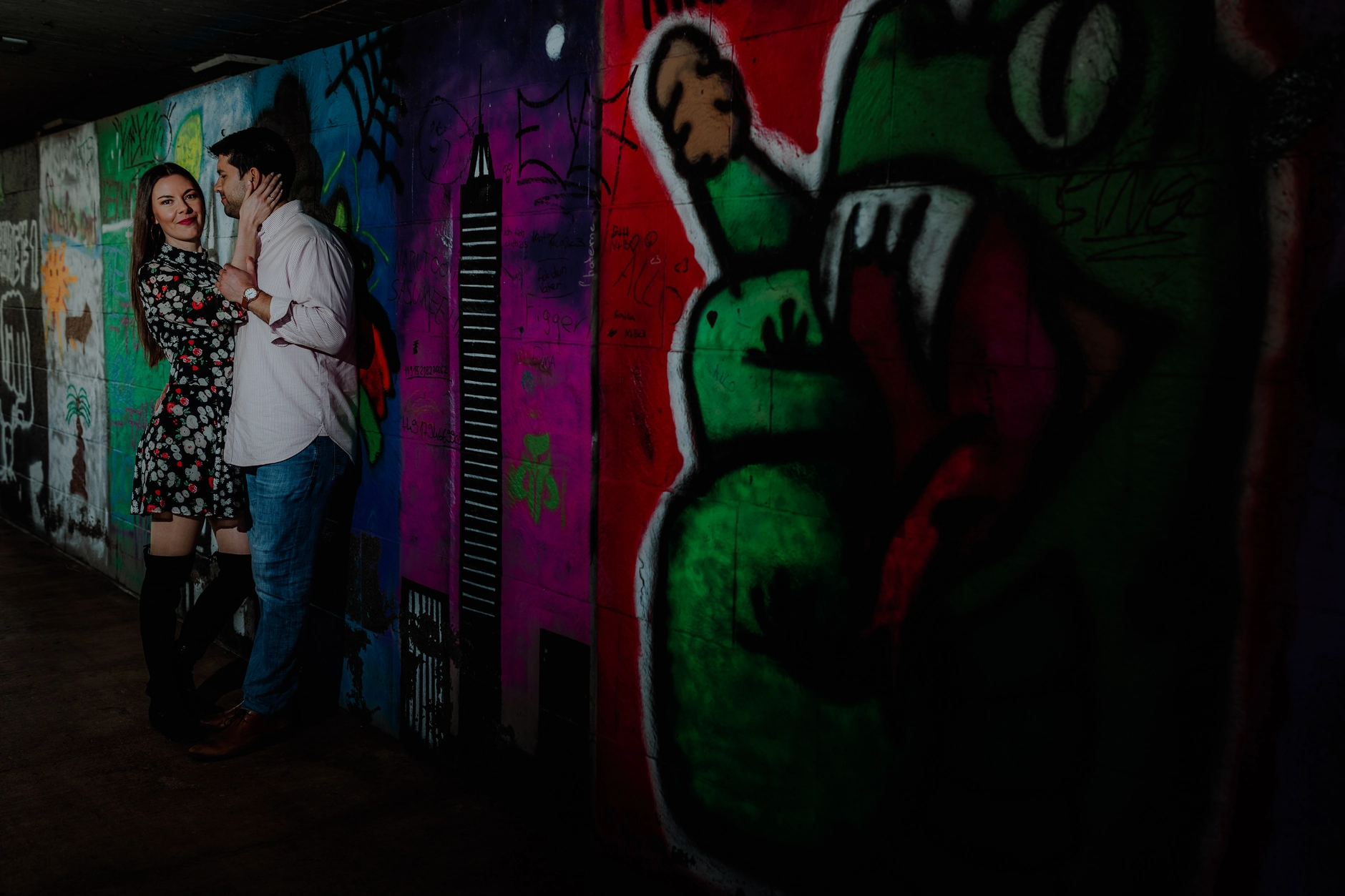 Graffiti and walkway beneath the bridge