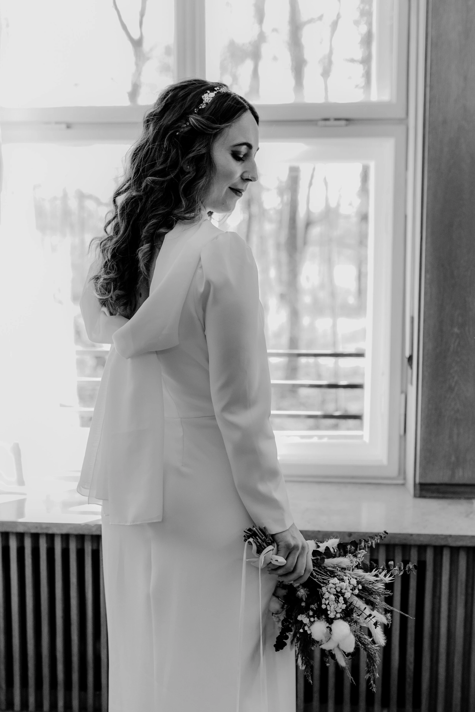 Africa and Yussuf, black-and-white portrait of the bride by the window