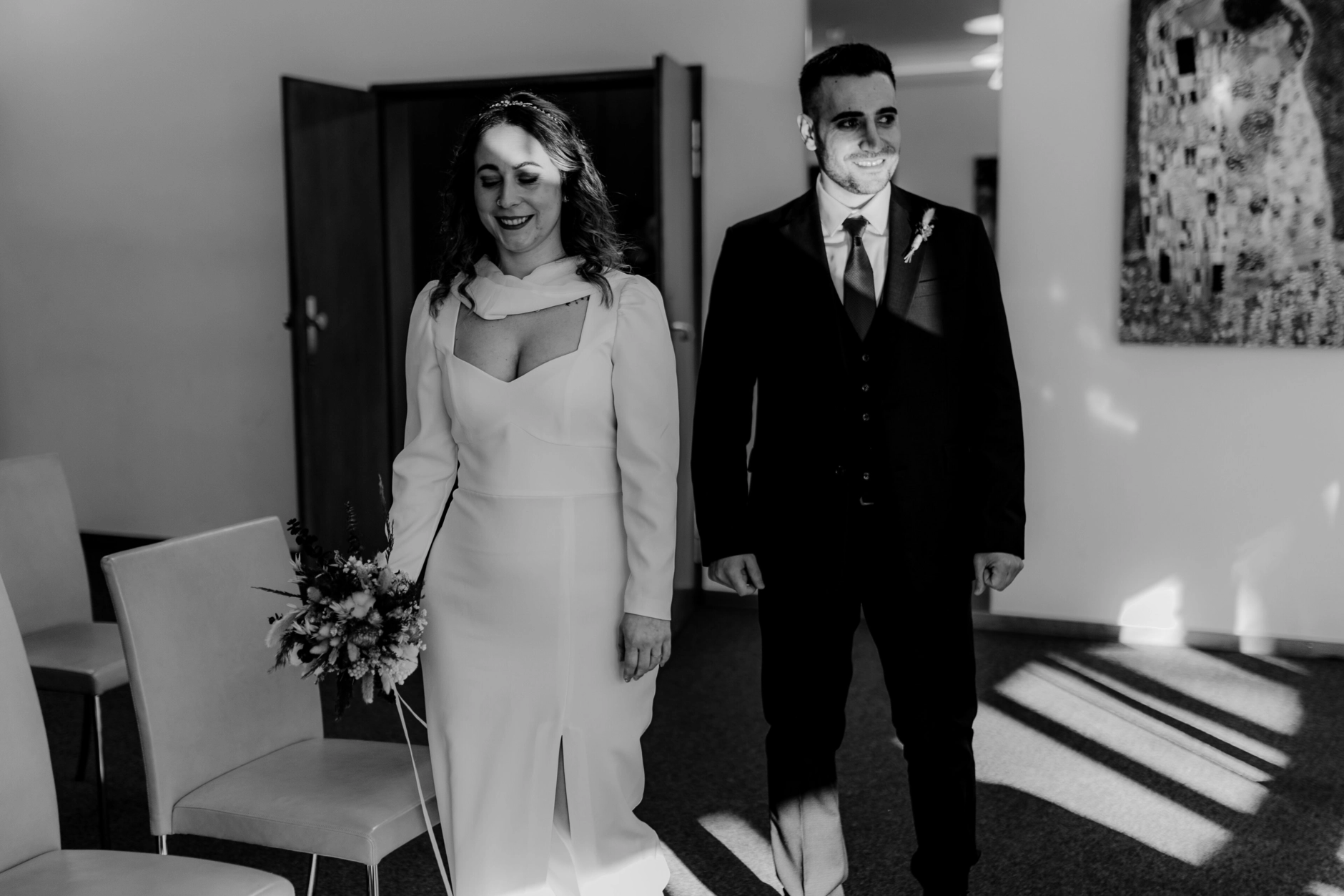 Africa and Yussuf with the officiant during the civil wedding ceremony