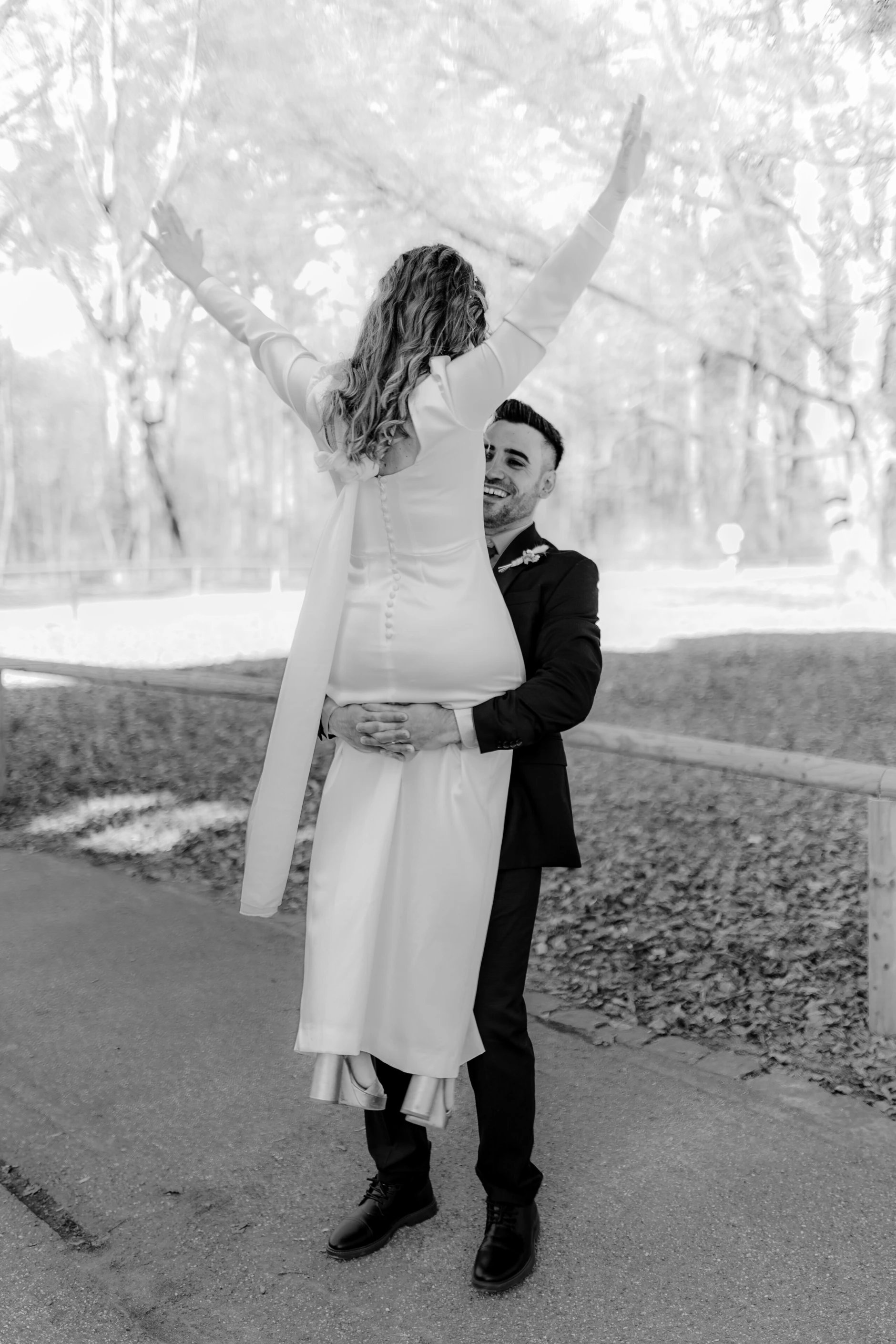 Africa and Yussuf, playful full-body outdoor portrait in winter light