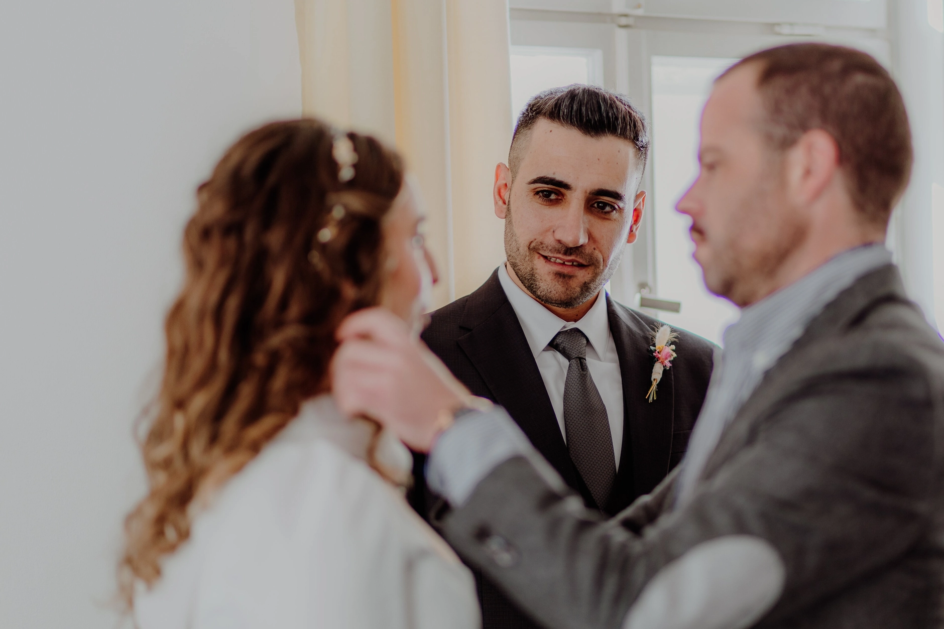 Africa and Yussuf facing each other during the civil ceremony at Schwabing Registry Office