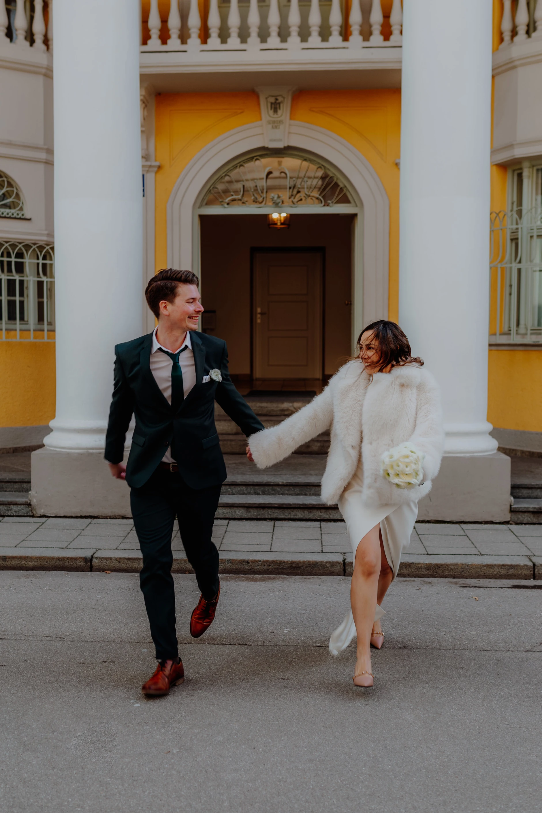 Paulina and Pascal – Leaving Standesamt Schwabing in front of the yellow facade, Munich